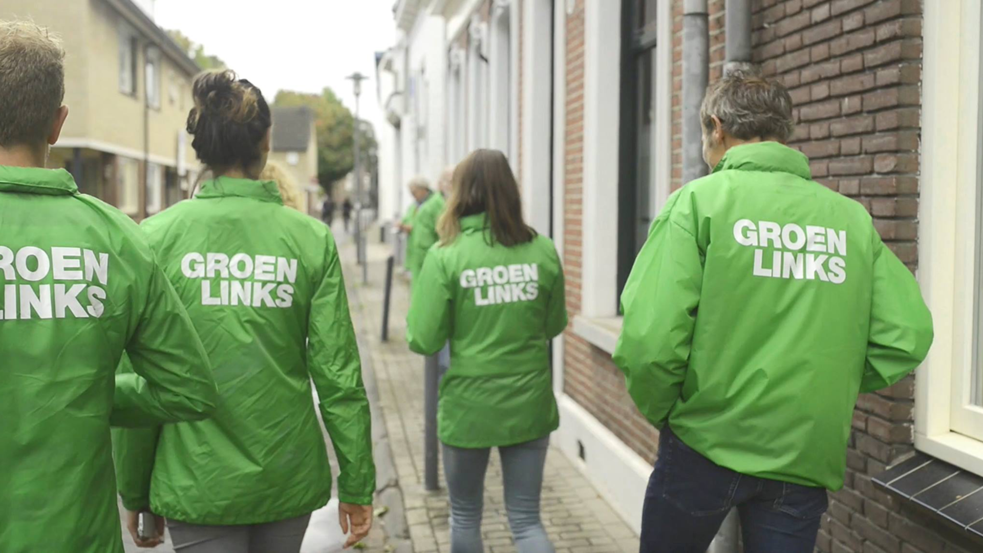 Mensen in GroenLinks jassen